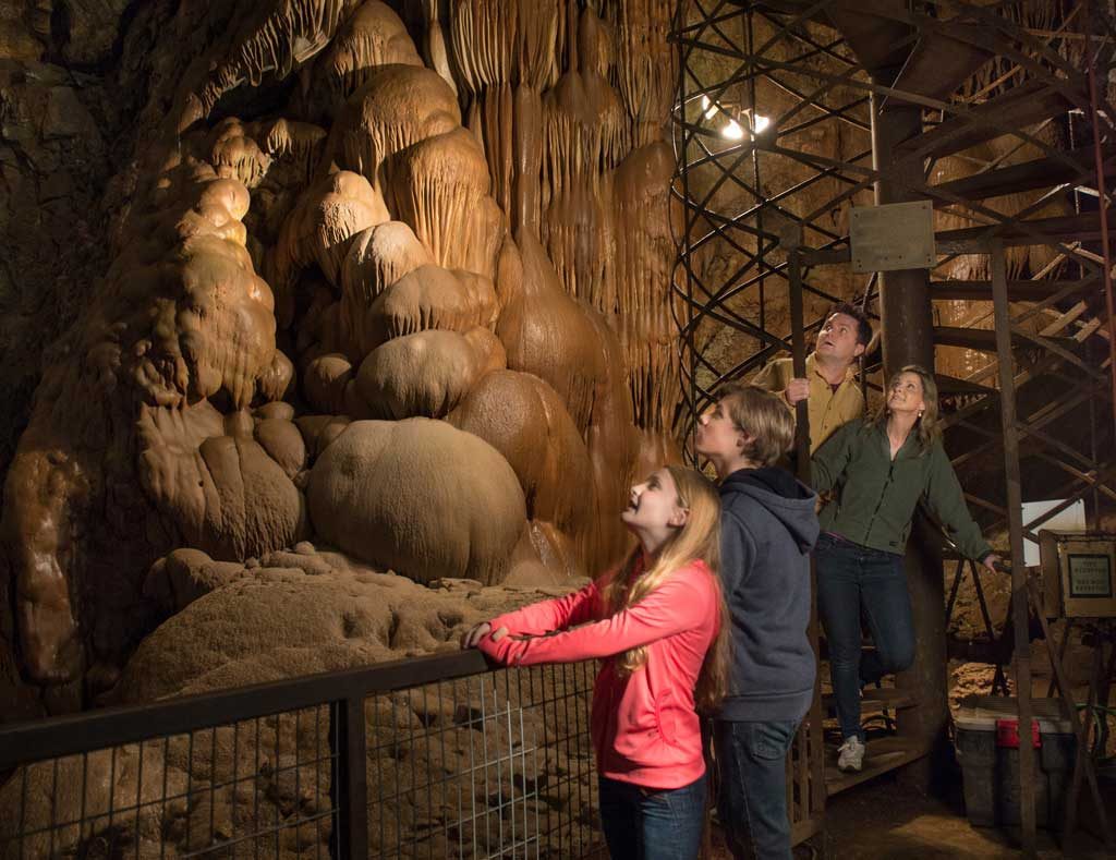 Family inside Moaning Caverns